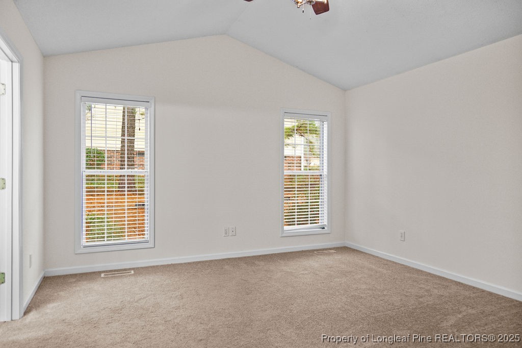 330 Fox Run Road Pinehurst, NC 28374 - Photo 21 of 31 an empty room with windows