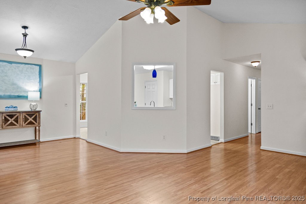330 Fox Run Road Pinehurst, NC 28374 - Photo 7 of 31 a view of a livingroom with wooden floor