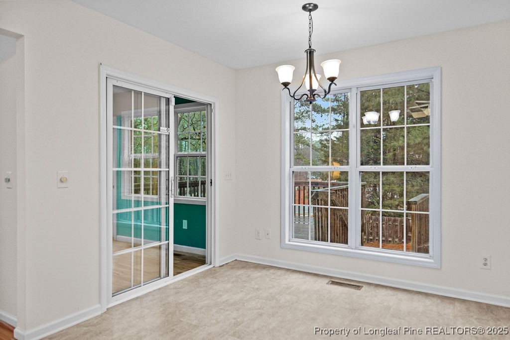 330 Fox Run Road Pinehurst, NC 28374 - Photo 10 of 31 a view of an empty room with a window