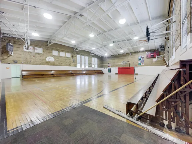 a view of a swimming pool with a lot of chairs