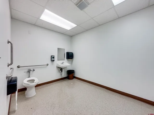 a view of house with a yard