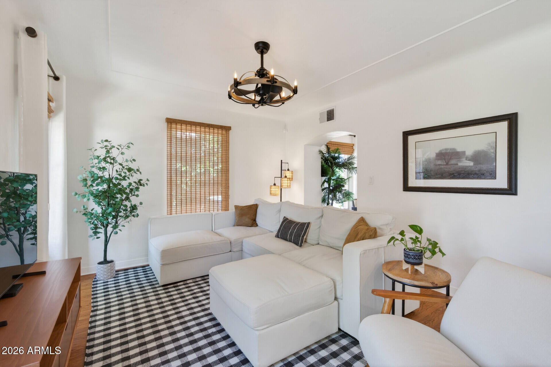 130 East Alvarado Road Phoenix, AZ 85004 - Photo 14 of 49 a living room with furniture a chandelier and a window