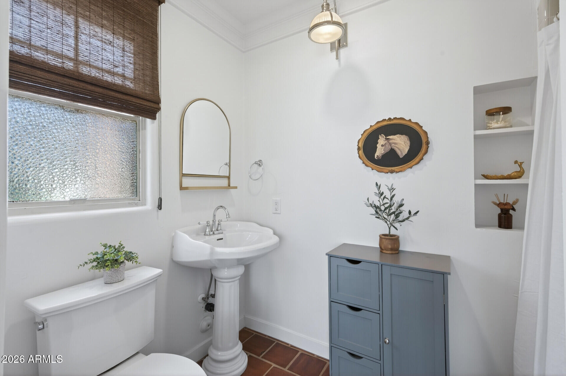 130 East Alvarado Road Phoenix, AZ 85004 - Photo 20 of 49 a bathroom with a sink mirror and toilet