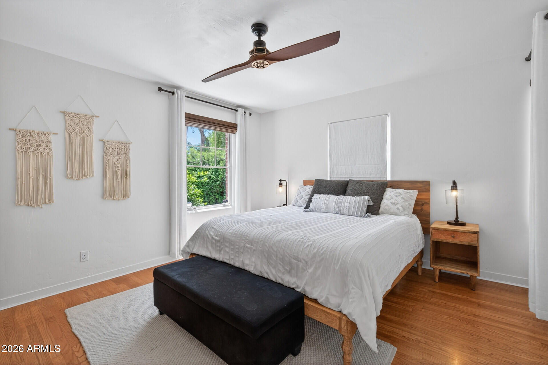 130 East Alvarado Road Phoenix, AZ 85004 - Photo 21 of 49 a bedroom with bed and window