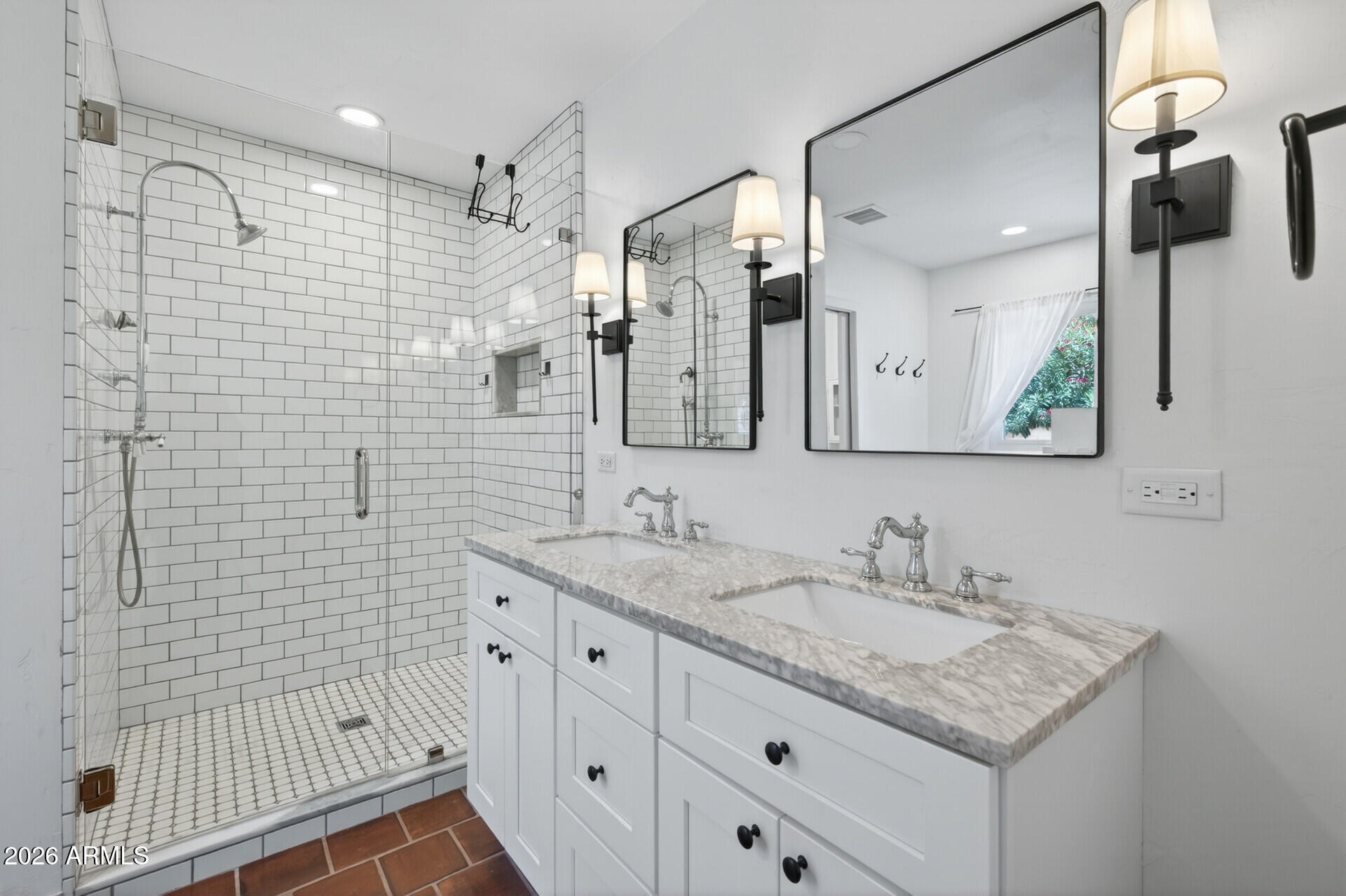 130 East Alvarado Road Phoenix, AZ 85004 - Photo 25 of 49 a bathroom with a granite countertop sink a mirror and shower
