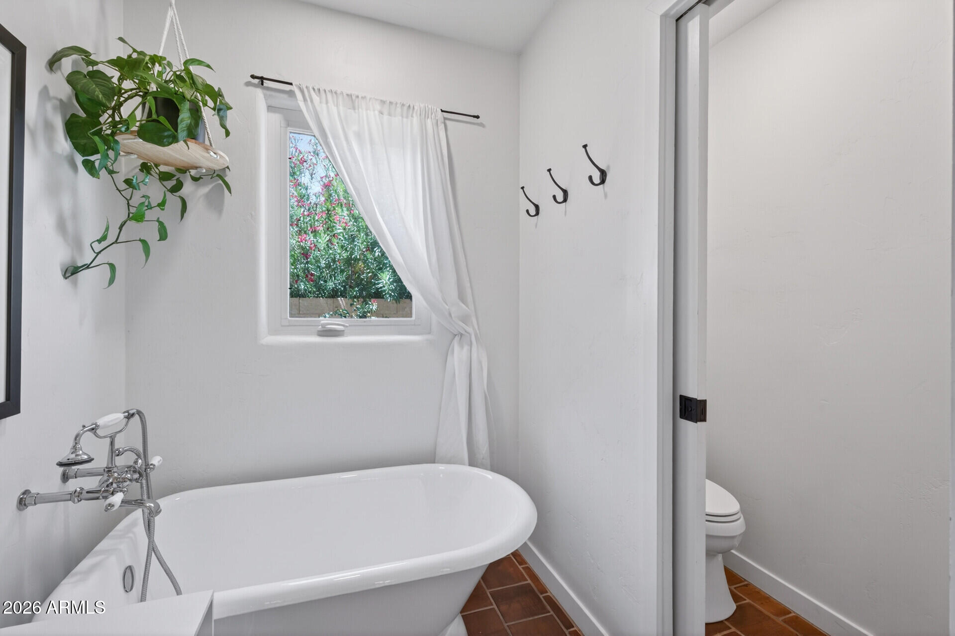 130 East Alvarado Road Phoenix, AZ 85004 - Photo 26 of 49 a bathroom with a bathtub and shower