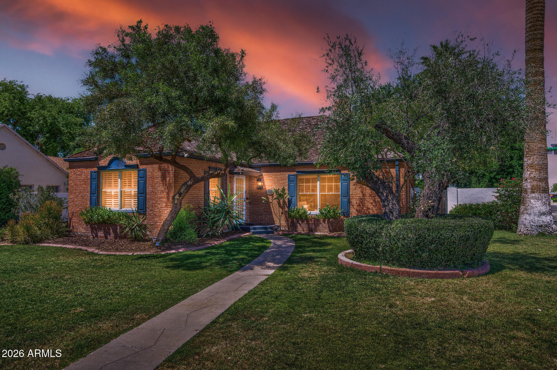 130 East Alvarado Road Phoenix, AZ 85004 - Photo 2 of 49 a front view of a house with a yard