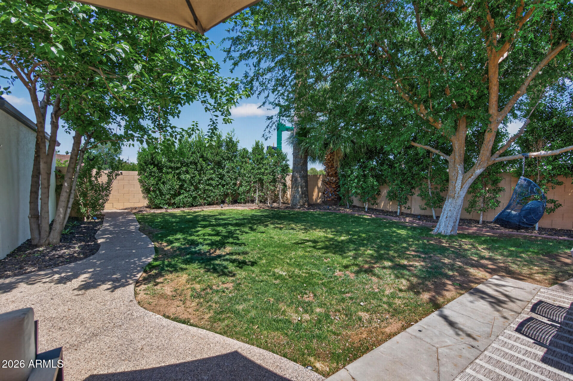 130 East Alvarado Road Phoenix, AZ 85004 - Photo 38 of 49 a view of a backyard with large trees