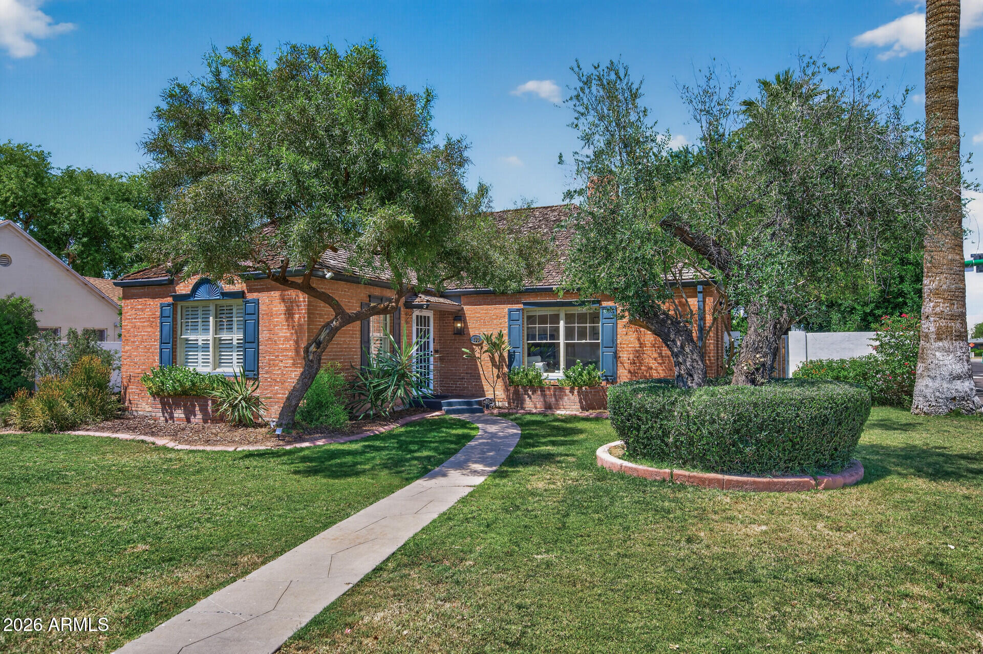 130 East Alvarado Road Phoenix, AZ 85004 - Photo 3 of 49 a front view of a house with a yard