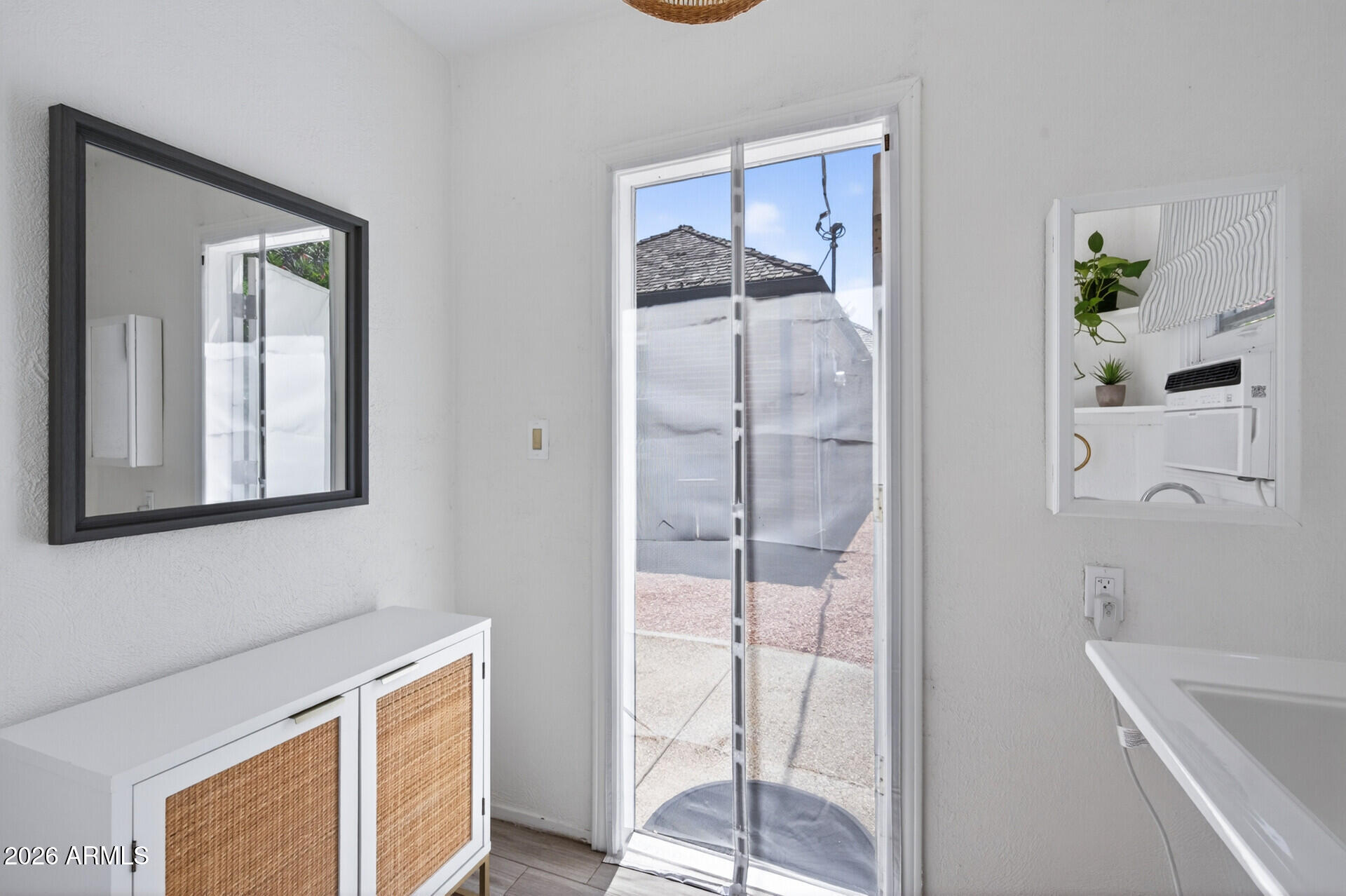 130 East Alvarado Road Phoenix, AZ 85004 - Photo 46 of 49 a bathroom with a bathtub and a shower