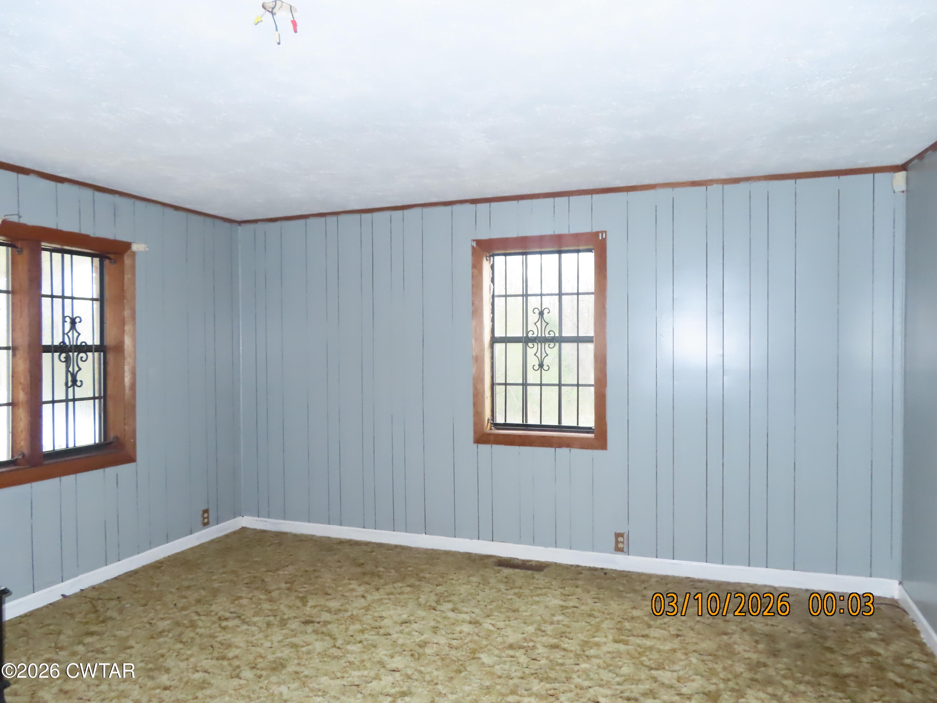 900 Hubberd Town Road Beech Bluff, TN 38313 - Photo 2 of 19 an empty room with windows