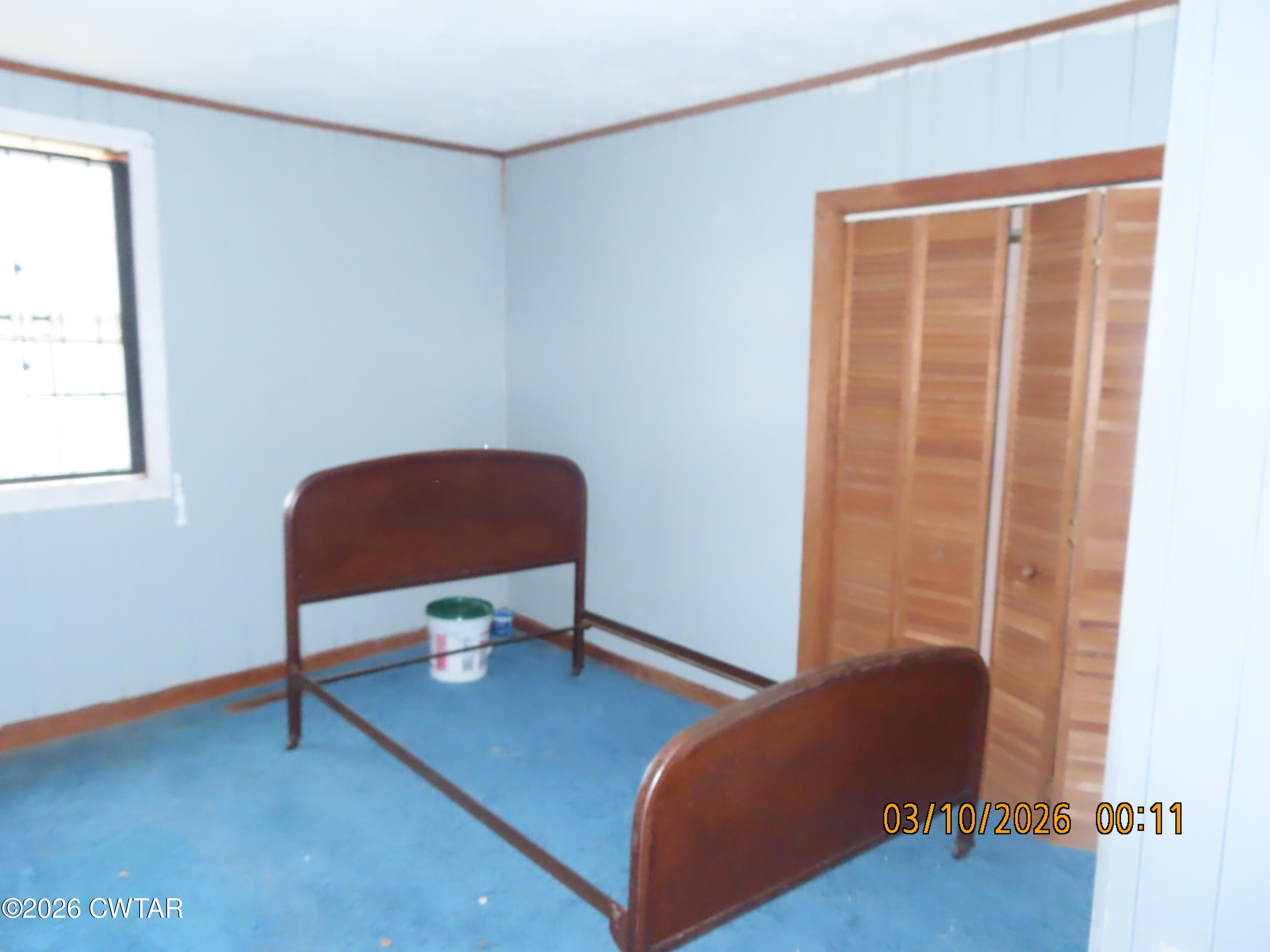 900 Hubberd Town Road Beech Bluff, TN 38313 - Photo 8 of 19 a living room with furniture and a window