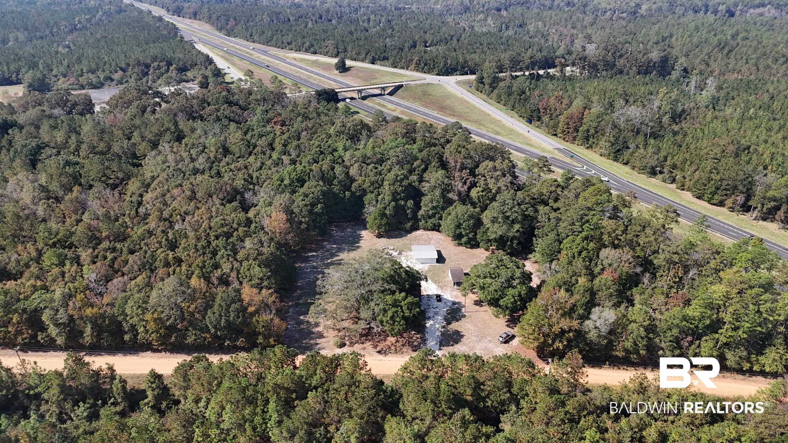 287 Green Road Castleberry, AL 36432 - Photo 2 of 53 Aerial view of cabin and 12 acres