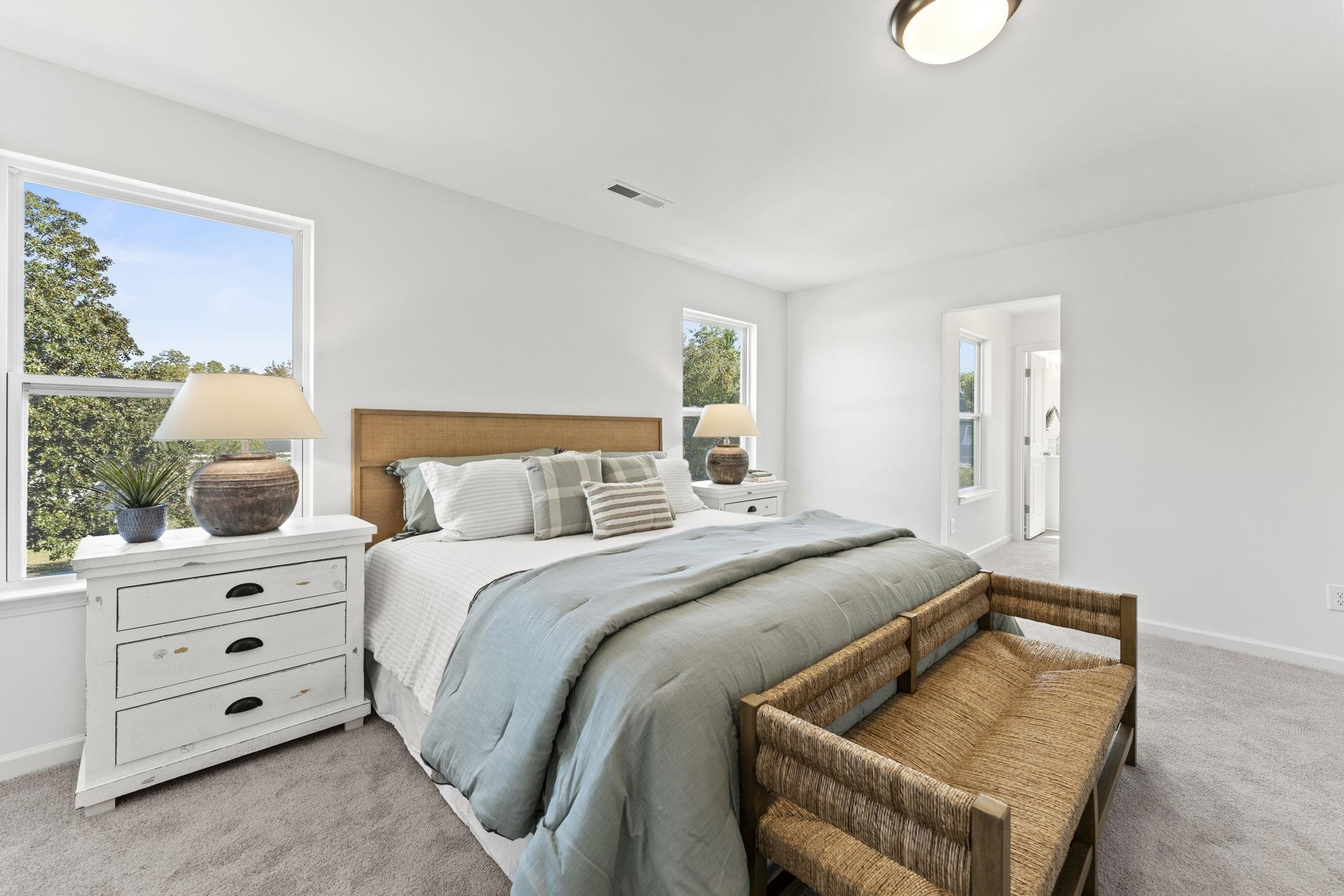 402 Cliff Court, Unit 9 Benson, NC 27504 - Photo 15 of 25 a bedroom with a bed and a window