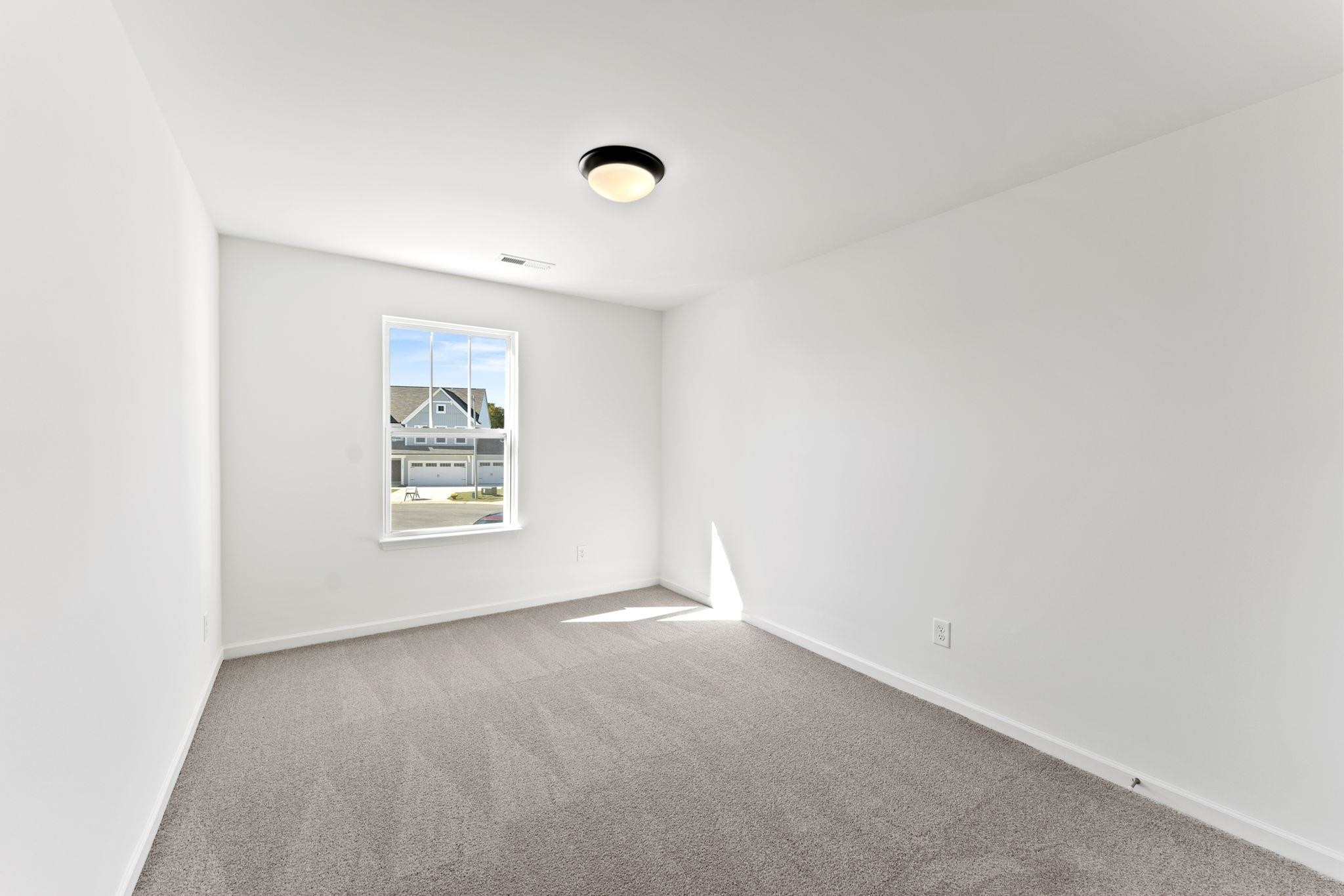 402 Cliff Court, Unit 9 Benson, NC 27504 - Photo 24 of 25 a view of a window in a room