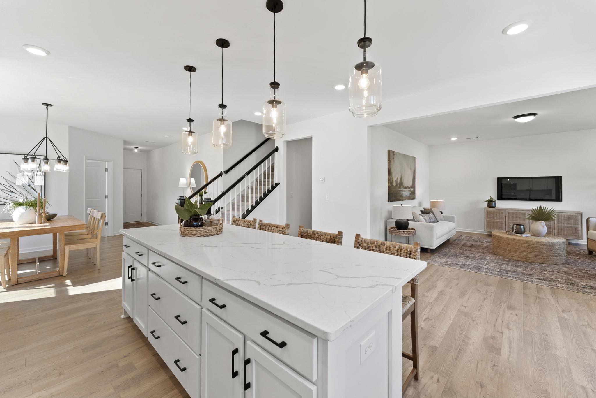 402 Cliff Court, Unit 9 Benson, NC 27504 - Photo 6 of 25 a very nice looking room with a large bed and a chandelier