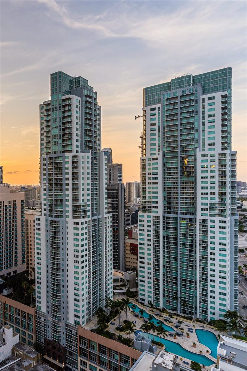 253 Northeast 2nd Street, Unit 3902 Miami, FL 33132 - Photo 41 of 47 a front view of a building with glass windows