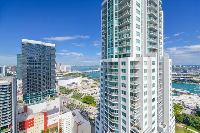 a view of a city with tall buildings