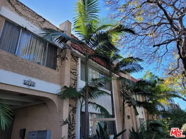a view of a house with a garden