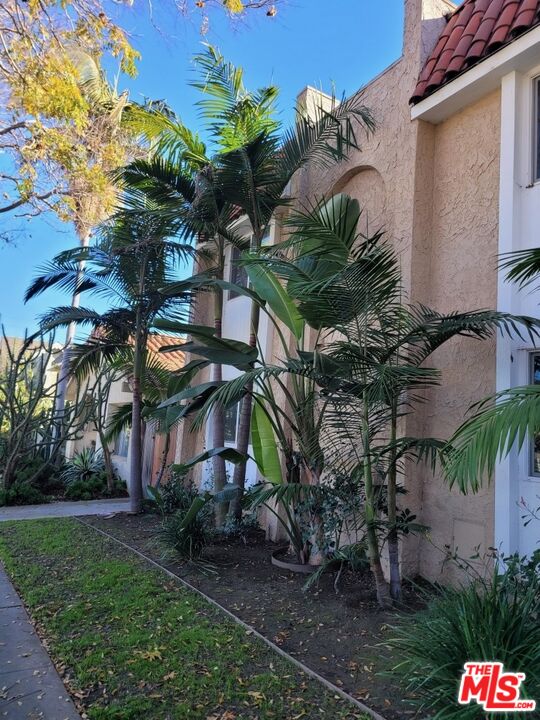 4244 East 5th Street Long Beach, CA 90814 - Photo 3 of 10 a view of a house with a garden