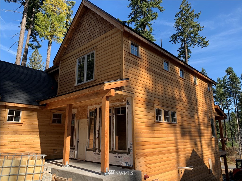 145 Maple Leaf Loop Cle Elum, WA 98922 - Photo 2 of 11 a view of a house with a tree