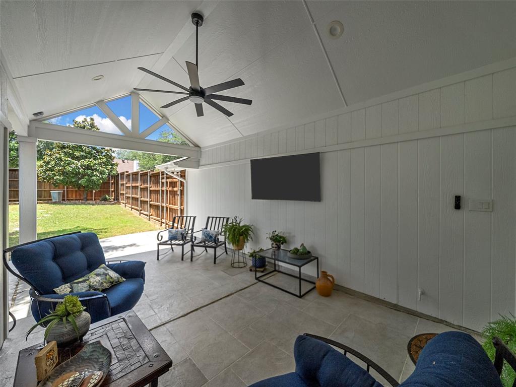 204 Arbor Ridge Drive Allen, TX 75002 - Photo 27 of 36 Covered patio featuring a vaulted ceiling with exposed white trusses, a ceiling fan, recessed lighting, and large format tile flooring