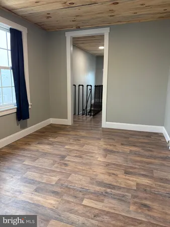 a view of a livingroom with a staircase