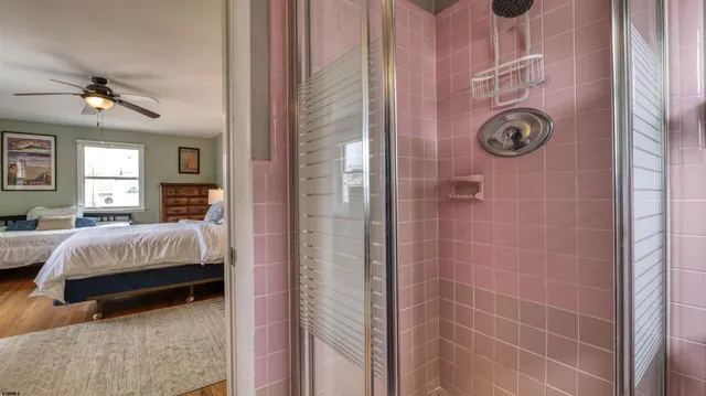 a view of a balcony with two chairs and a deck