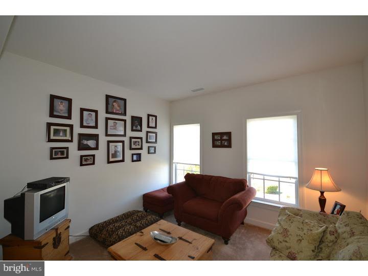 245 Barnhill Road Perkasie, PA 18944 - Photo 12 of 25 a bed room with a bed furniture and a window