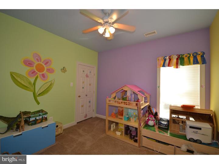 245 Barnhill Road Perkasie, PA 18944 - Photo 13 of 25 a bedroom with furniture and a window