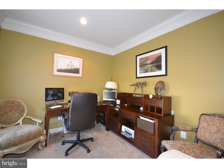 245 Barnhill Road Perkasie, PA 18944 - Photo 8 of 25 a workspace with furniture and lamp