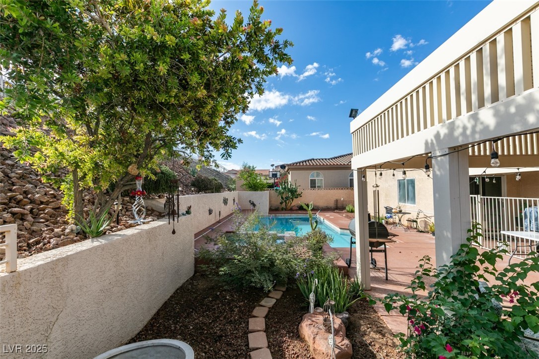 1860 Racine Drive Las Vegas, NV 89156 - Photo 19 of 36 View of swimming pool with a patio and a fenced backyard