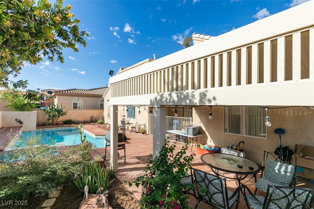 1860 Racine Drive Las Vegas, NV 89156 - Photo 20 of 36 View of swimming pool featuring a patio area and outdoor dining area