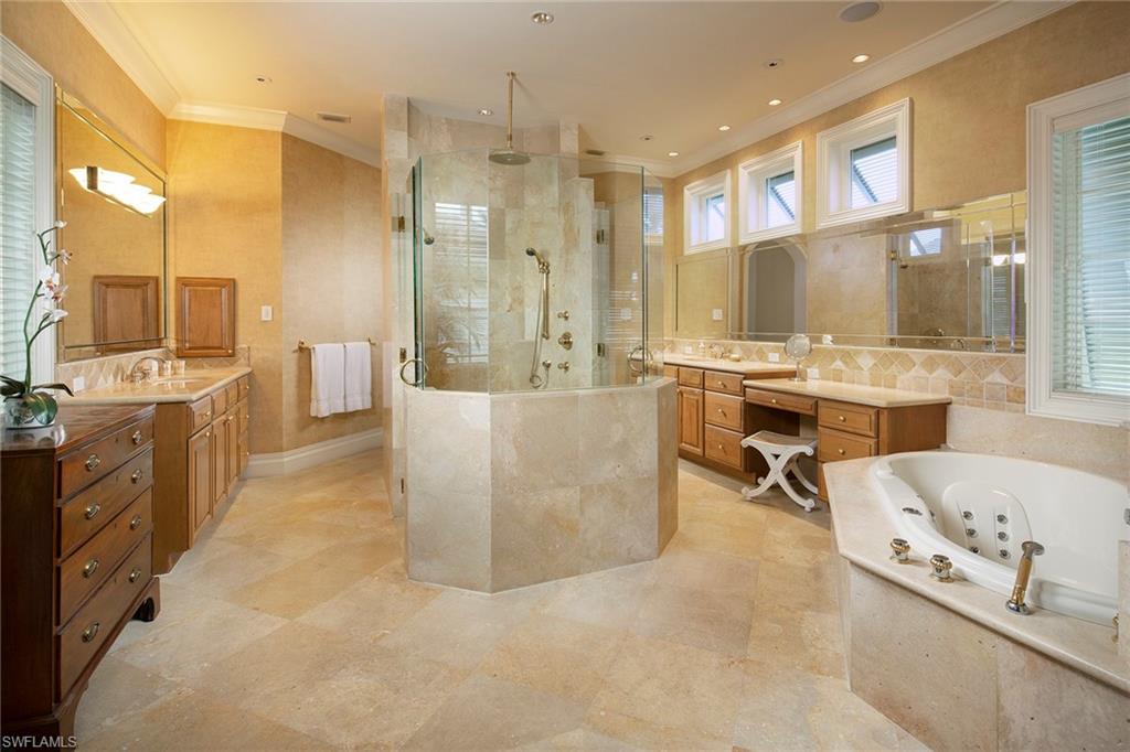 330 Neptunes Bight Naples, FL 34103 - Photo 6 of 8 a large kitchen with a large counter top appliances and cabinets