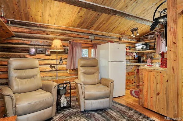 a projector room with a couch and a table