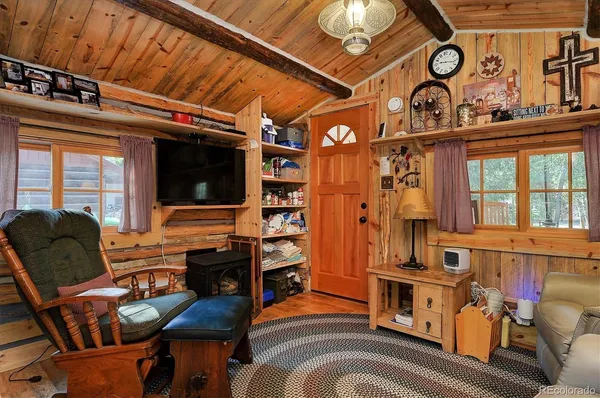 a view of a livingroom with furniture