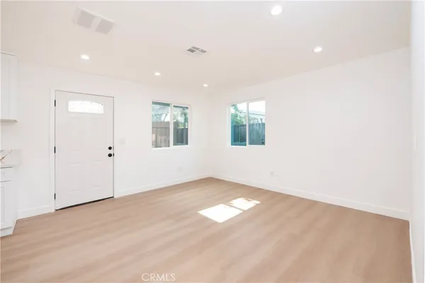 an empty room with windows