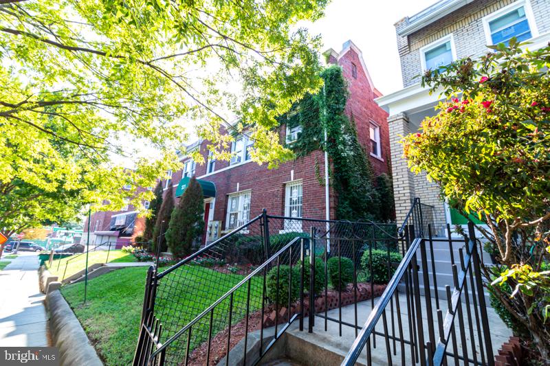 321 Adams Street Northeast Washington, DC 20002 - Photo 3 of 5 Charming brick homes in vibrant setting.