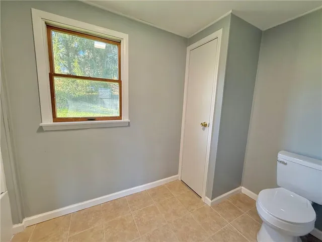 a bathroom with a toilet