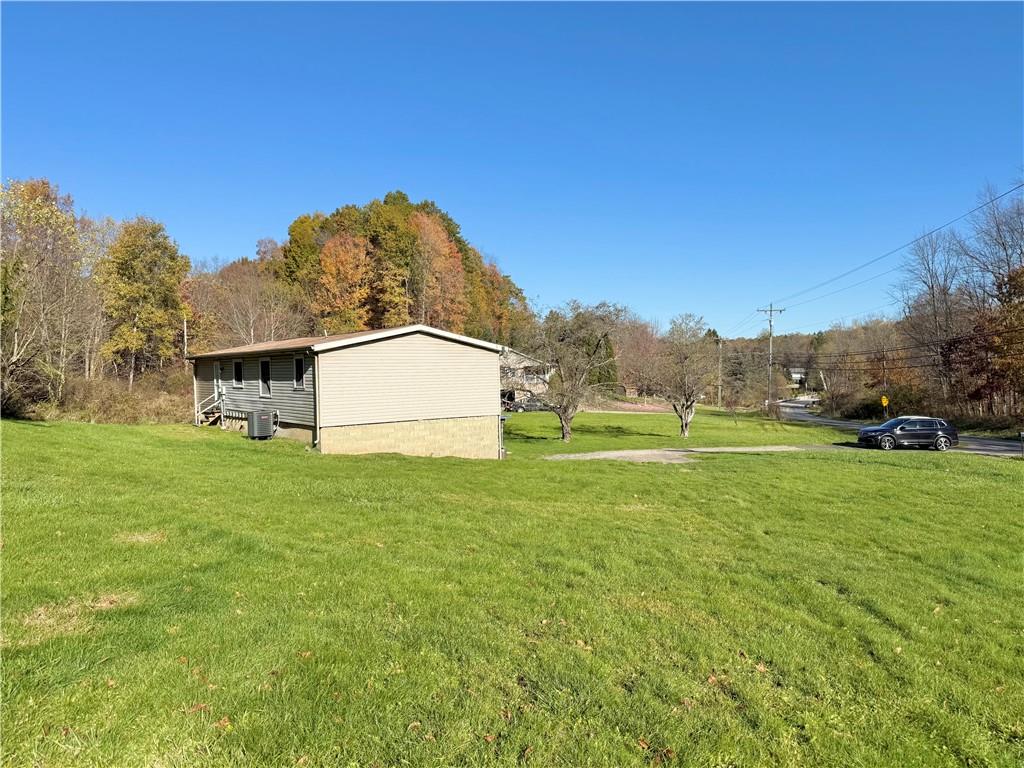 1285 Old Pulaski Road New Castle, PA 16105 - Photo 16 of 19 a view of a field of grass and trees