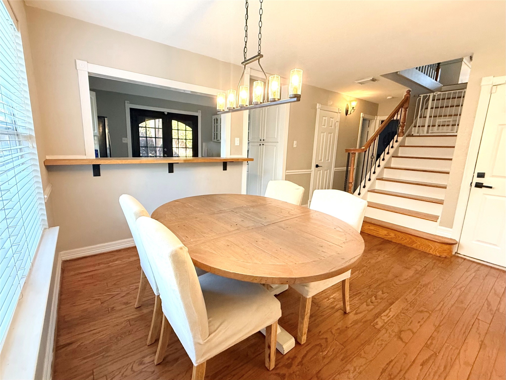 16902 Colony Creek Drive Spring, TX 77379 - Photo 4 of 18 a view of a dining room with furniture and wooden floor