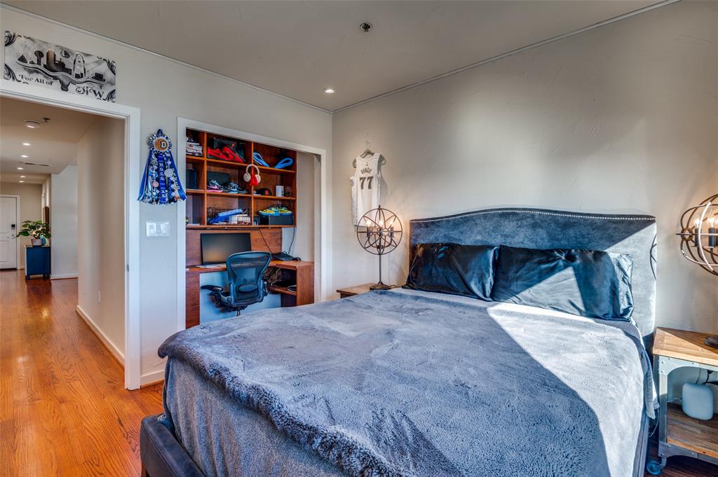 1200 Main Street, Unit 2412 Dallas, TX 75202 - Photo 22 of 36 a bedroom with a bed and closet