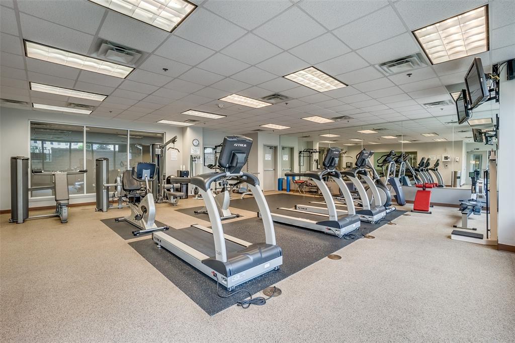 1200 Main Street, Unit 2412 Dallas, TX 75202 - Photo 32 of 36 a view of a room with gym equipment