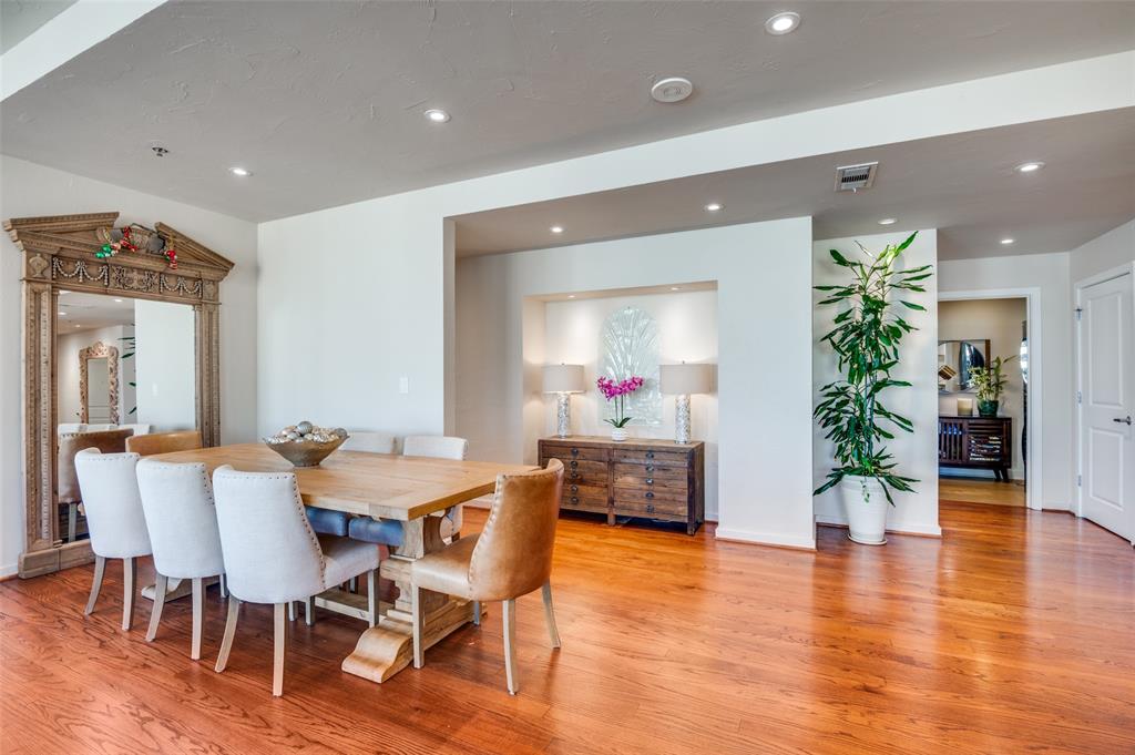 1200 Main Street, Unit 2412 Dallas, TX 75202 - Photo 9 of 36 a view of a dining room with furniture and wooden floor