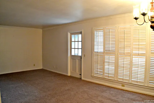 a view of a room with a window