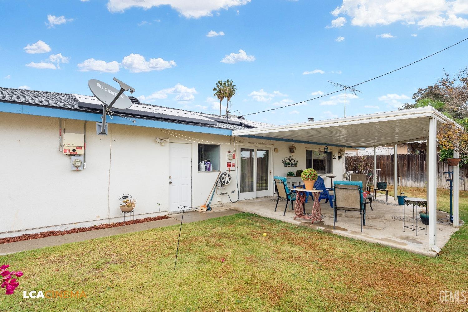 Undisclosed Address Bakersfield, CA 93306 - Photo 27 of 27 a view of a patio with a table and chairs