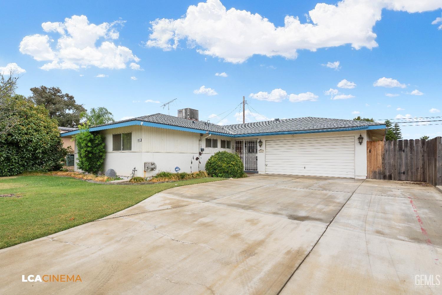 Undisclosed Address Bakersfield, CA 93306 - Photo 4 of 27 a view of backyard of house and trees