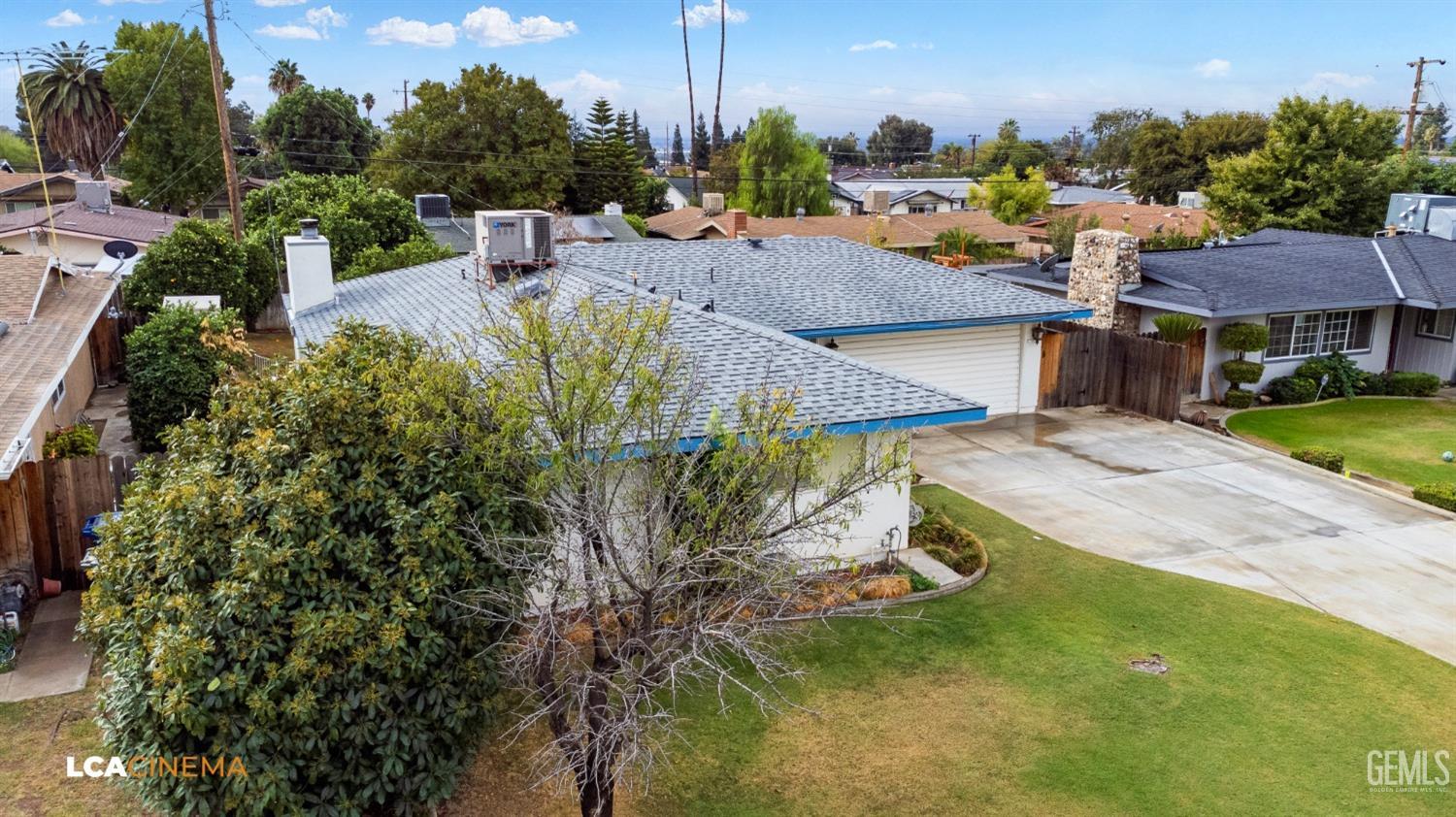 Undisclosed Address Bakersfield, CA 93306 - Photo 7 of 27 an aerial view of a house with swimming pool garden and patio