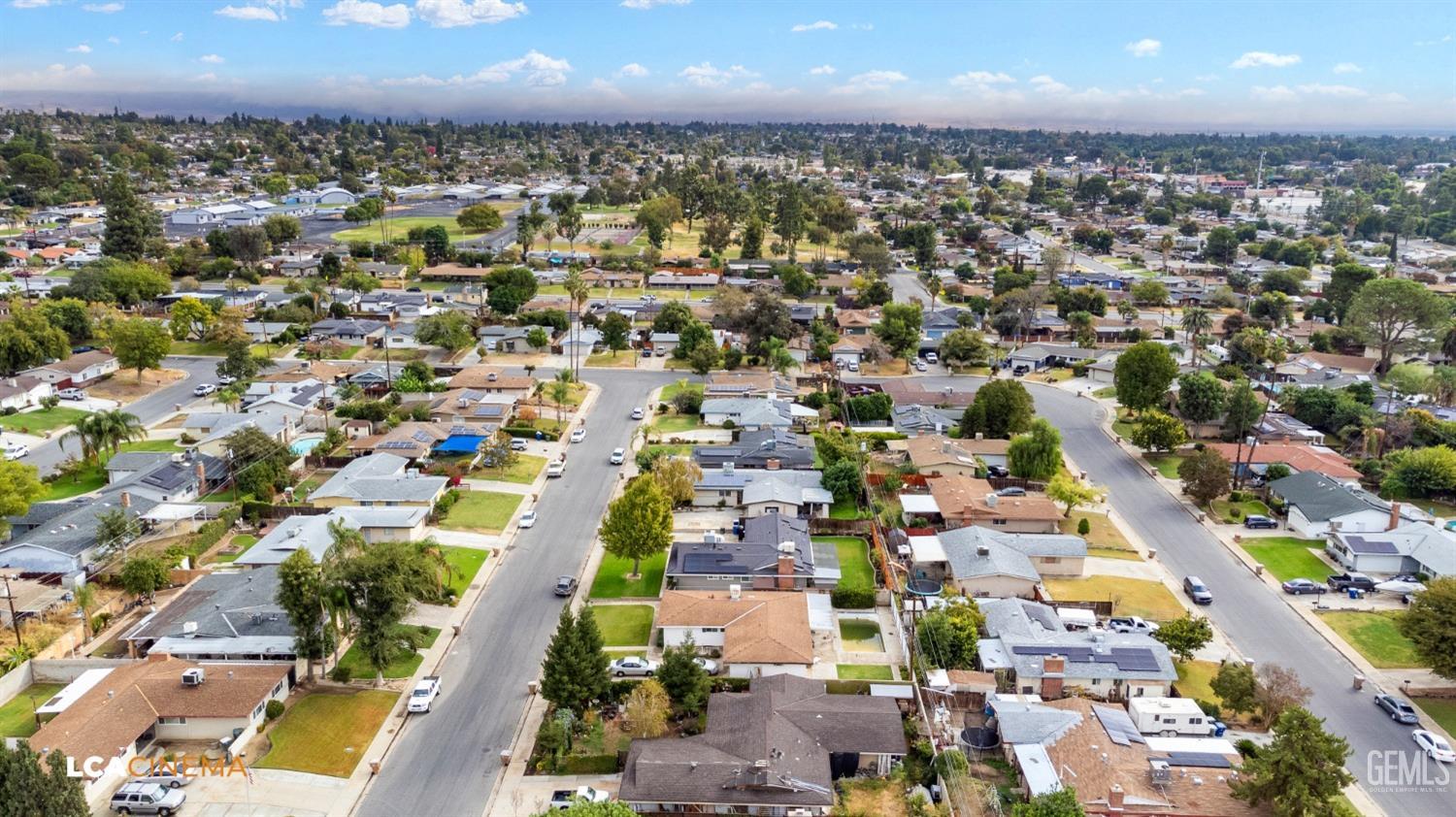 Undisclosed Address Bakersfield, CA 93306 - Photo 9 of 27 an aerial view of residential houses with outdoor space