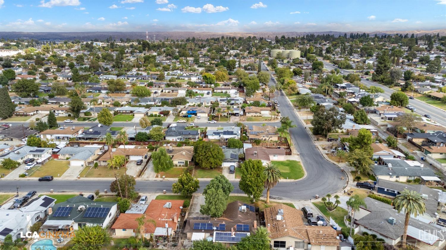 Undisclosed Address Bakersfield, CA 93306 - Photo 10 of 27 an aerial view of residential houses with outdoor space and trees